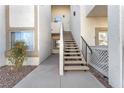 Exterior condo entry with stairs leading to unit at 1690 Normandy Way # 824, Henderson, NV 89014