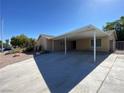 Front view of house with carport and driveway at 2604 Yardley St, Las Vegas, NV 89102