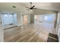 Spacious living room with wood-look floors and high ceiling at 2604 Yardley St, Las Vegas, NV 89102