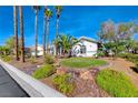 House exterior showcasing landscaping and a circular driveway at 4620 Clay Peak Dr, Las Vegas, NV 89129