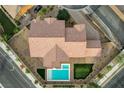 Aerial view of house, pool, and landscaped yard at 4807 Enchanted View St, Las Vegas, NV 89149