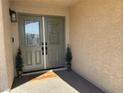 Inviting entryway with double doors and decorative glass at 5640 Judith Resnik Ct, Las Vegas, NV 89103