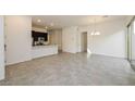 Open concept dining area with tile flooring and kitchen view at 746 Chopin Hills St, Henderson, NV 89011