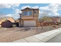 Two-story house with a brick driveway and attached garage at 772 Crimson Peak Pl, Henderson, NV 89011