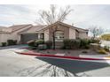 Single-story home with attached garage and nicely landscaped front yard at 8634 Lakota St, Las Vegas, NV 89123