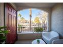 Covered patio with seating and views of the complex at 950 Seven Hills Dr # 2017, Henderson, NV 89052