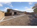 Large backyard with patio, fire pit and solar panels at 10229 Angels Loft St, Las Vegas, NV 89131