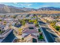 Aerial view showing home's setting within a residential neighborhood at 10654 Suffolk Hills Ave, Las Vegas, NV 89129