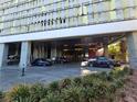 Building entrance with valet parking and modern design at 4381 W Flamingo Rd # 2116, Las Vegas, NV 89103