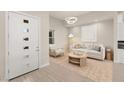 Cozy sitting area with comfortable seating and natural light at 6056 Willow Rock St, Las Vegas, NV 89135