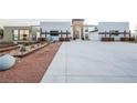 Modern home with two-car garage and desert landscaping at 7815 W La Madre Way, Las Vegas, NV 89149