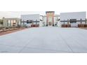Modern home with two-car garage and desert landscaping at 7815 W La Madre Way, Las Vegas, NV 89149