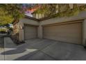 Two-car garage with spacious driveway and plenty of parking at 9236 Arbor Glen St, Las Vegas, NV 89123
