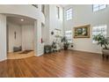 Spacious living room with hardwood floors and high ceilings at 9236 Arbor Glen St, Las Vegas, NV 89123