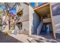 Condo building exterior showcasing stairs and landscaping at 2200 S Fort Apache Rd # 1065, Las Vegas, NV 89117