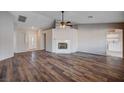 Bright living room featuring wood floors and fireplace at 2214 Sexton Ave, North Las Vegas, NV 89031