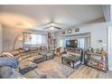 Living room features hardwood floors and a sectional sofa at 309 Wisteria Ave, Las Vegas, NV 89107