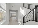 Bright entryway with tile flooring and a view to the living room at 3494 Brezine Ave, Henderson, NV 89044