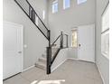 Modern staircase with metal railing and tile flooring at 3494 Brezine Ave, Henderson, NV 89044