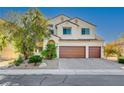 Two-story house with a three-car garage and attractive landscaping at 3733 Via Di Girolamo Ave, Henderson, NV 89052