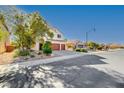 Two-story house on a quiet street with mature trees at 3733 Via Di Girolamo Ave, Henderson, NV 89052