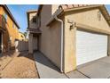 View of the home's entrance and garage at 4150 Pohickery Ct, Las Vegas, NV 89115