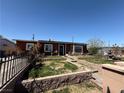 Charming home featuring a landscaped front yard with a brick walkway leading to the front door at 4559 S Nellis Blvd, Las Vegas, NV 89121