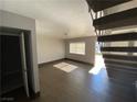 Living room with dark floors and access to exterior at 520 S 13Th St # D4, Las Vegas, NV 89101