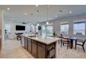 Modern kitchen with large island and breakfast bar at 859 Benning St, Henderson, NV 89011