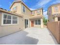 Spacious patio adjacent to a two-story house at 8970 College Green St, Las Vegas, NV 89148