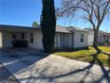 House with carport and well-maintained lawn at 509 5Th St, Boulder City, NV 89005