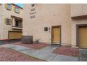 Building exterior showing a walkway to the entrance at 5925 Palmilla St # 12, North Las Vegas, NV 89031