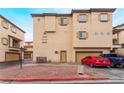 Two-story building with multiple units, garages and parking at 5925 Palmilla St # 12, North Las Vegas, NV 89031