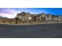Two-story home with attached garage and desert landscaping at 8838 Sorrel Hills Ct, Las Vegas, NV 89113