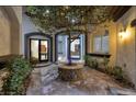 Peaceful courtyard with a tree and brick flooring at 2 Yorkridge Ct, Henderson, NV 89052