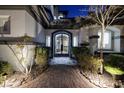 Ornate iron gate entry to a beautiful home at 2 Yorkridge Ct, Henderson, NV 89052