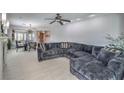 Spacious living room with large sectional sofa and fireplace at 3 Chatmoss Rd, Henderson, NV 89052