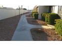 Concrete walkway leading through a landscaped area at 316 Linn Ln, Las Vegas, NV 89110