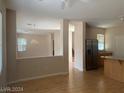 Open living area with hardwood floors and high ceilings at 1434 Summer Glow Ave, Henderson, NV 89012