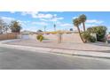 Single story home with attached garage and palm trees at 3829 Delaware Ln, Las Vegas, NV 89169