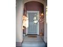 Front entrance with security door and decorative mat at 5402 Cross Meadows Ln, Las Vegas, NV 89122