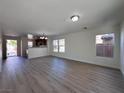 Bright living room with laminate flooring and access to backyard at 1096 Country Coach Dr, Henderson, NV 89002