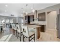 Spacious kitchen featuring an island, modern cabinetry, and stainless steel appliances at 11275 Idyllic Dr # 101, Las Vegas, NV 89135