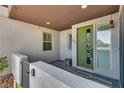 Inviting entryway with green door and tile flooring at 1254 Venue St # 102, Las Vegas, NV 89135