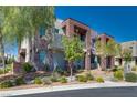 Contemporary townhome with attractive landscaping at 1254 Venue St # 102, Las Vegas, NV 89135