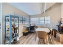 Bright dining area with table and chairs, and large window at 1324 Jessica Ave, Las Vegas, NV 89104