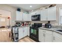 Modern kitchen with stainless steel appliances at 1324 Jessica Ave, Las Vegas, NV 89104