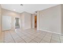 Spacious living room with tile floors and neutral walls at 1619 Wendell Williams Ave, Las Vegas, NV 89106