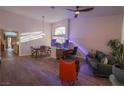 Living area featuring hardwood floors and large aquarium at 2044 Glorieta Ln, Las Vegas, NV 89134