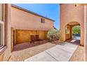 Relaxing side patio with two lounge chairs at 2744 Drummossie, Las Vegas, NV 89044